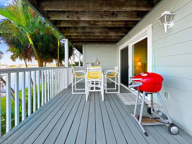 Building Photo - AVAILABLE APRIL 1ST! Stunning Waterfront Luxury – Fully Renovated & Furnished 2 Bed / 2 Bath