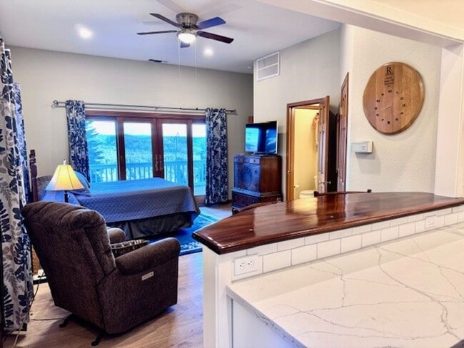 Building Photo - Beautiful Fully Furnished Studio Apartment with Long Range Views