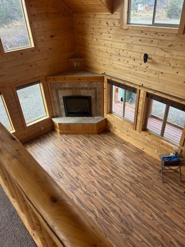Building Photo - Gorgeous Log Home with infloor heat.  Two level lots with RV parking and dumpstation.