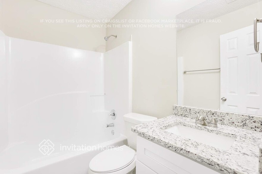 Building Photo - 50 Hidden Ridge Dr