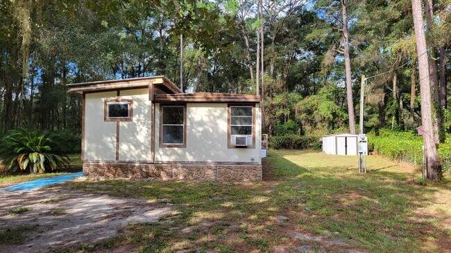 Building Photo - 2 Bed | 1 1/2 Bath | Fenced & Gated 1/4 Acre of land