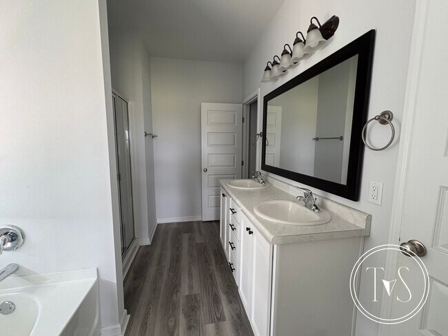 Building Photo - The perfect blend of modern living and small-town charm
