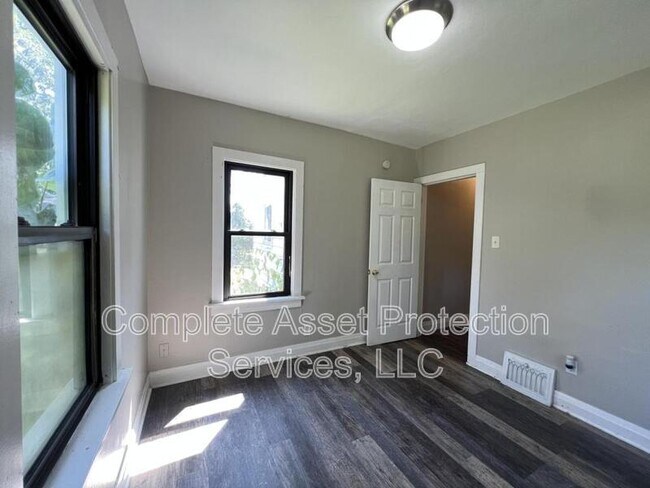 Building Photo - 6079 Madison St