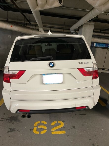 Heated, covered, secured parking spot included in rent - 1000 W Leland Ave