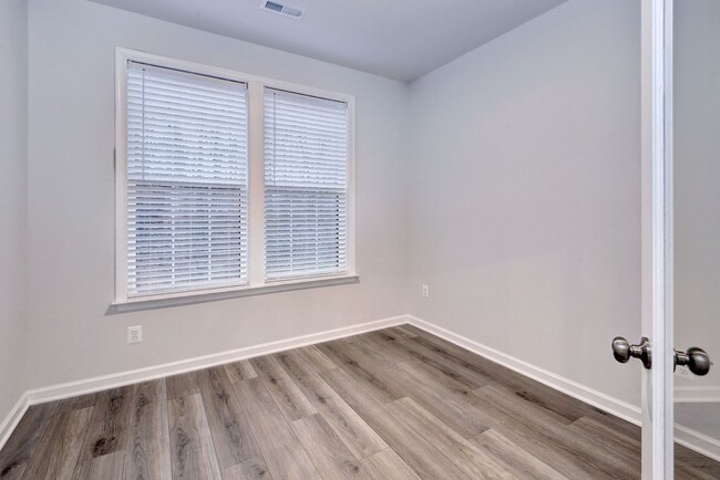 Building Photo - Three Story Brick End Unit with Rooftop Terrace