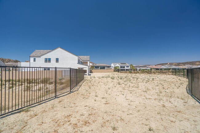 Building Photo - Spacious 5-Bedroom Home with Community Ame...
