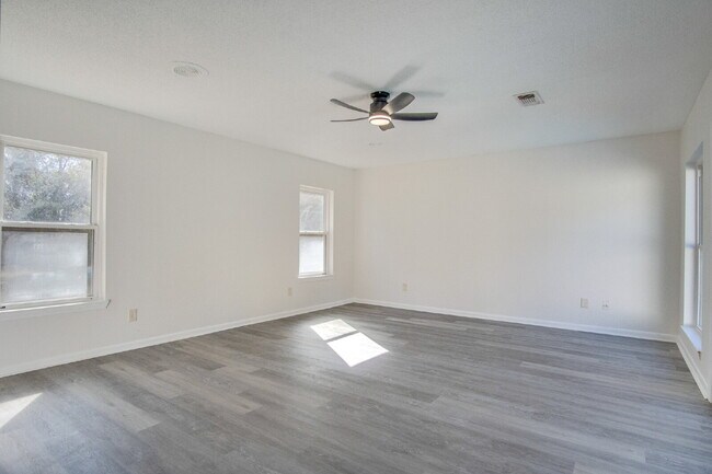 Building Photo - Stunning 4BR/2BA Pensacola Home with Private Pool, Modern Kitchen, Luxury Vinyl Flooring, Fully F...