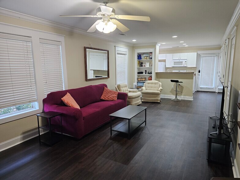 Furnished Living Room with a TV - 1725 Harvey Mitchell Pkwy S