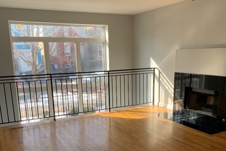 Upstairs living area w/ fireplace - 2327 S Sawyer Ave