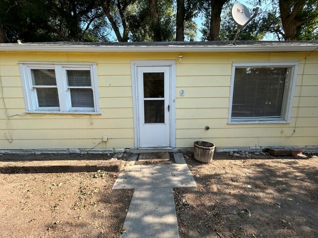 Building Photo - Large 2 Bed 1 Bath House with Fenced Yard and Washer Dryer Hookups