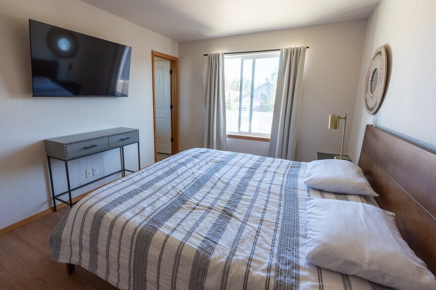 Main Bedroom - Spacious Walk in Closet with window. New KING memory foam mattress in 2026. View of C - 2805 W Dumont Dr