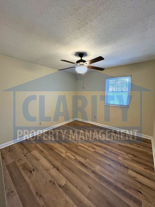 Building Photo - Three bedroom home w/ two bonus rooms!