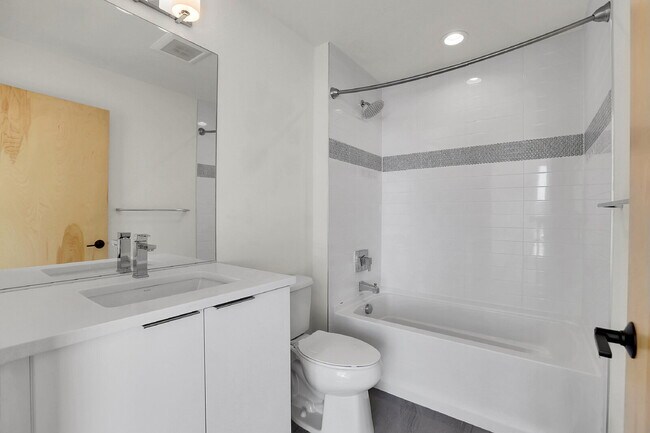 Building Photo - $3,100.00 - 2 Bedrooms, 2.2 Bathrooms, Townhouse in Denver with Roof Deck!