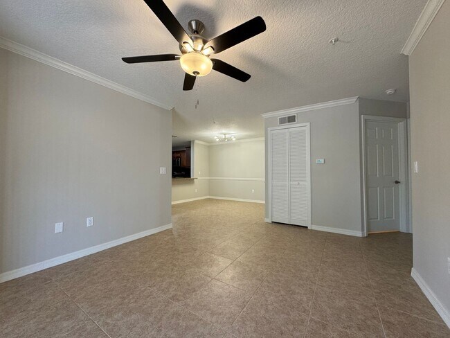 Building Photo - Oviedo 2/2 Condo with Tile & LVP Flooring, Updated Baths, New Paint & Appliances!