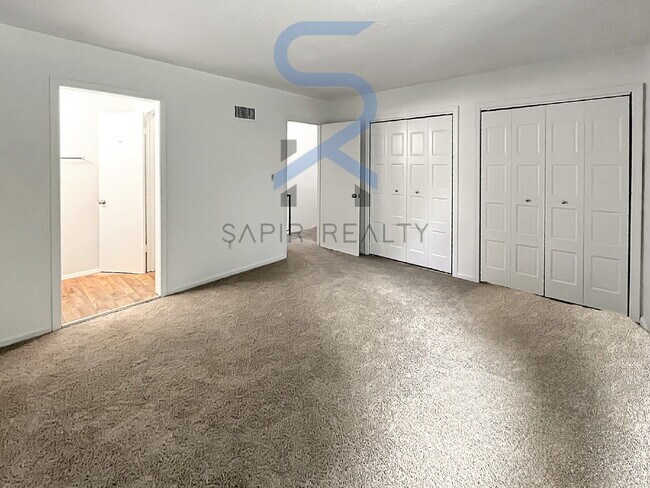 Building Photo - Move in before December 15th and choose your reward: a $250 Amazon Gift Card or a 55" Smart TV!