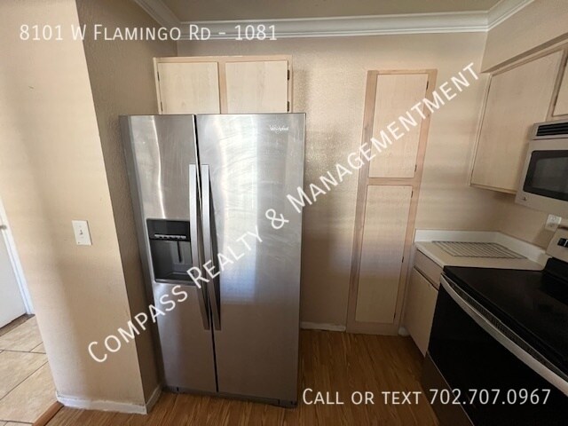 Building Photo - Welcome to your dream condo in this beauti...