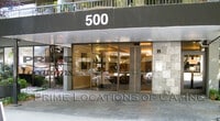 Building Photo - Experience Downtown Living with this upgra...