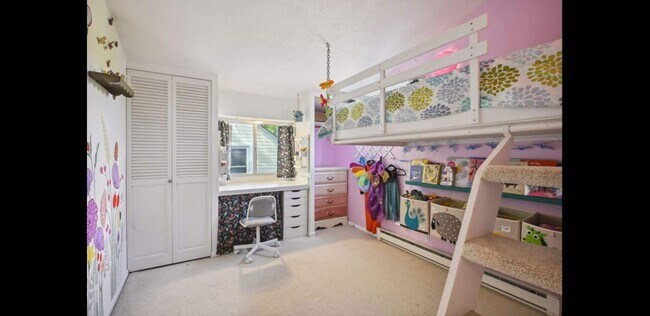 Bedroom 2 includes lofted bed frame with stairs and built in desk - 2740 Alabama Ave S