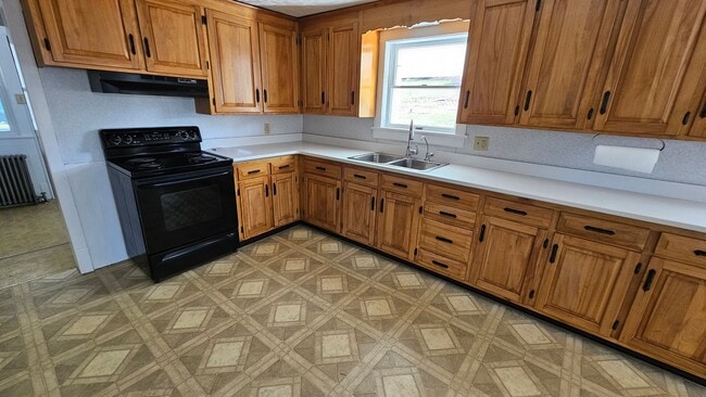 Building Photo - Country Living in This 4 Bedroom Farmhouse!