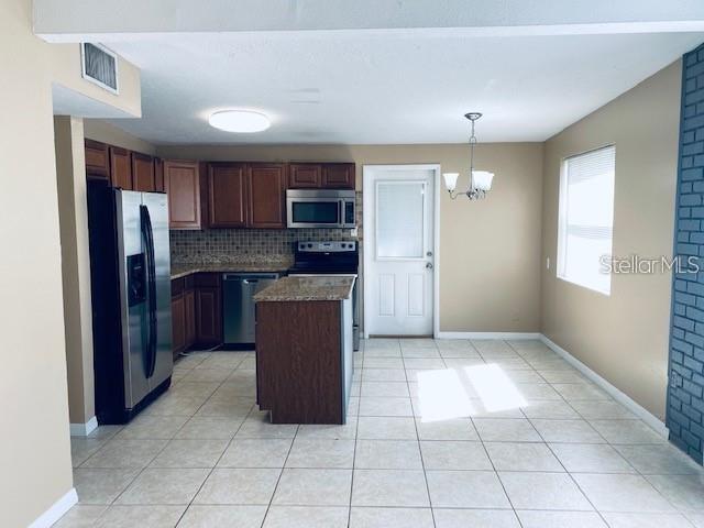 Building Photo - 8233 Portulaca Ave