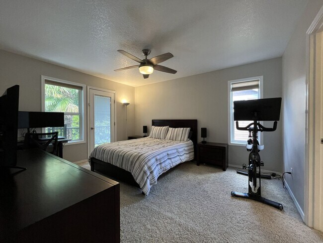 Building Photo - Spacious 3-Bedroom Home with Two Living Areas, Private Balcony, Fireplace & Attached 2-Car Garage