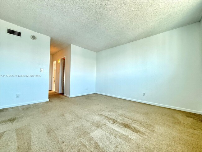 Building Photo - 19380 Collins Ave