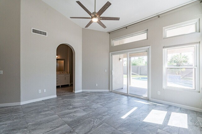 Building Photo - Charming 4-Bedroom Home with Luxurious Poo...