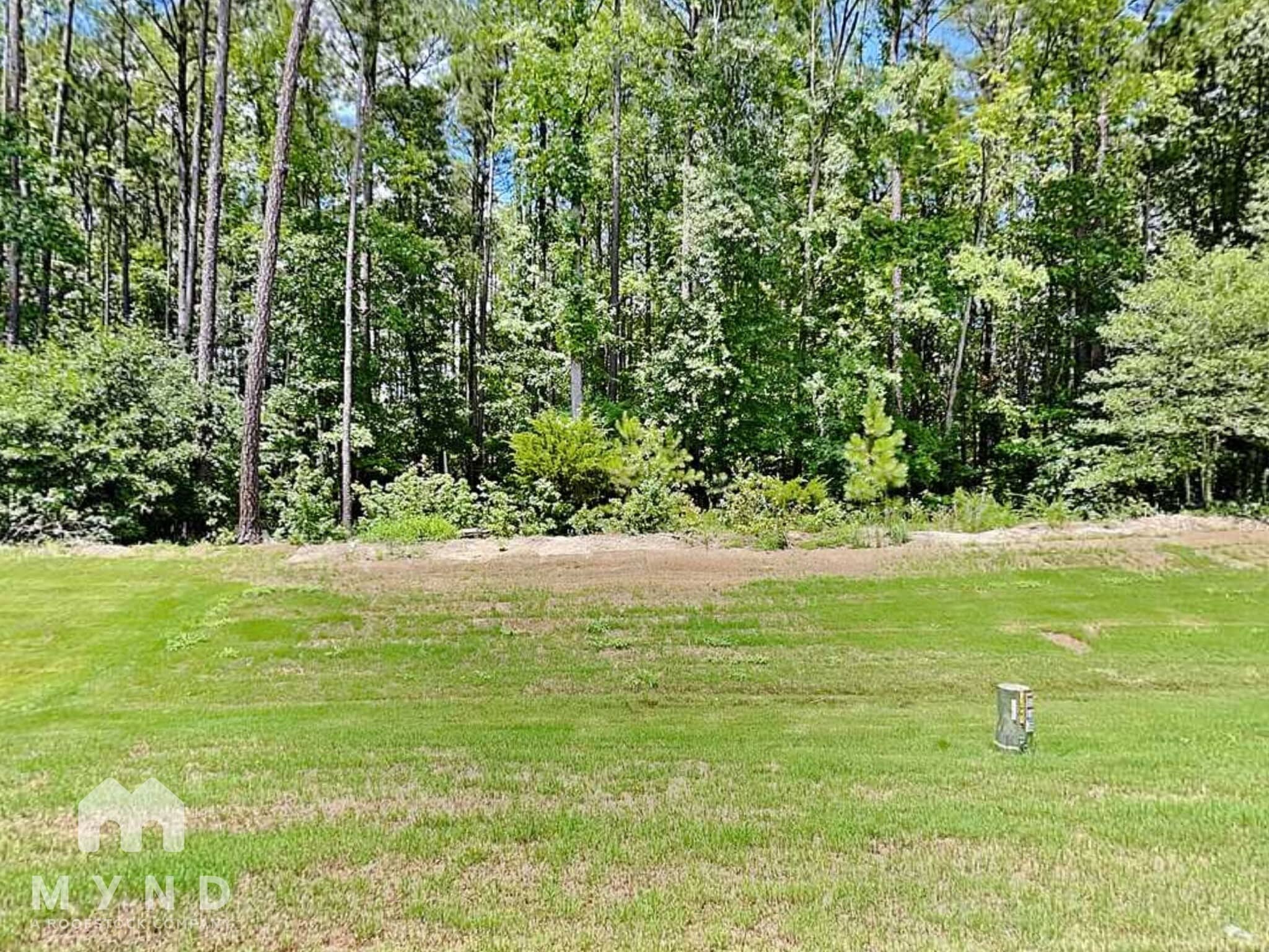 Building Photo - 6921 Woodland Stream Pl