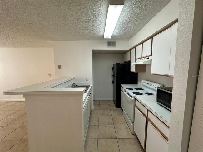 Building Photo - 2210 Grand Cayman Ct