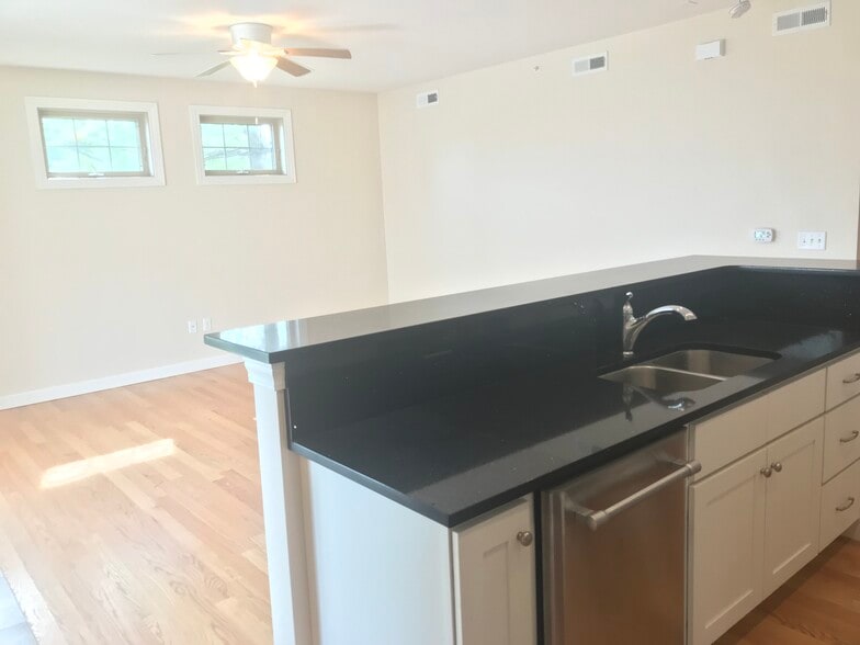 Hardwood floors and Quartz counters - 2500 Muscatine Ave