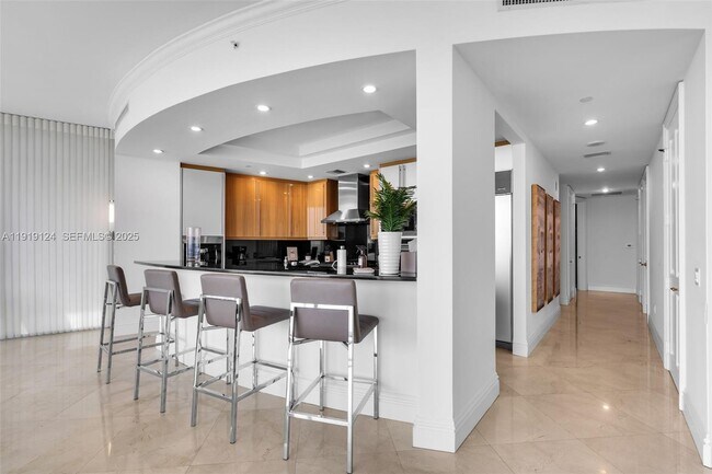 Building Photo - 10295 Collins Ave