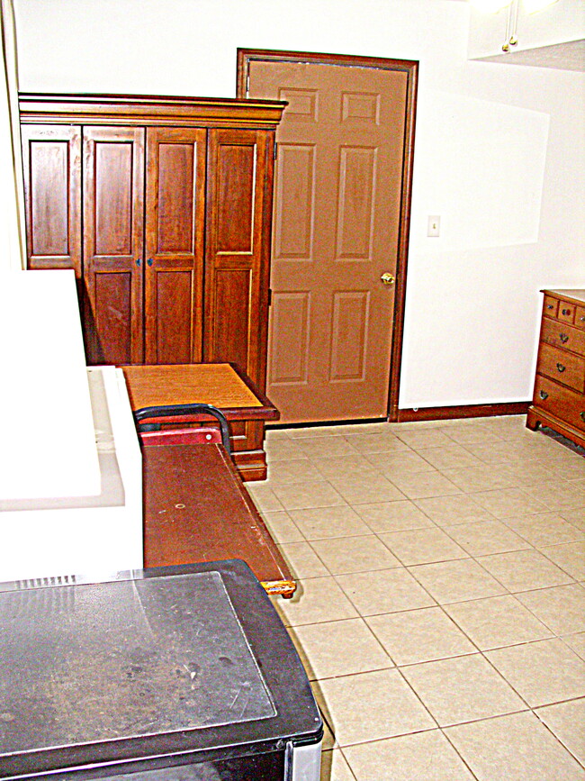 furnished space looking from bathroom - 2177 Kings Mountain Dr NE