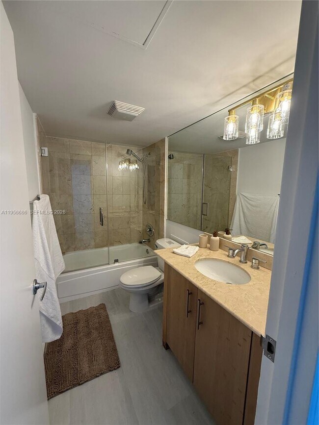 Building Photo - 10275 Collins Ave