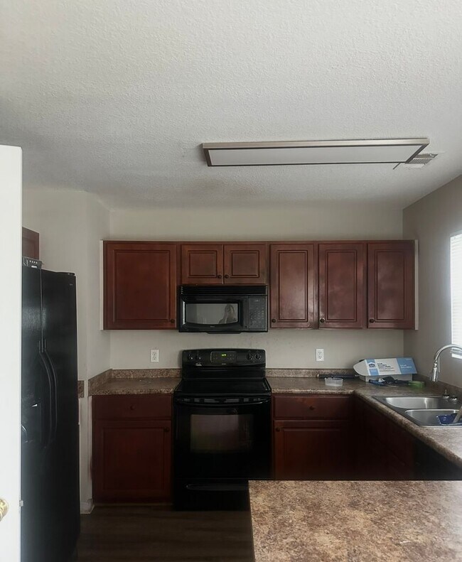 Building Photo - 9028 Whispering Pines Blvd