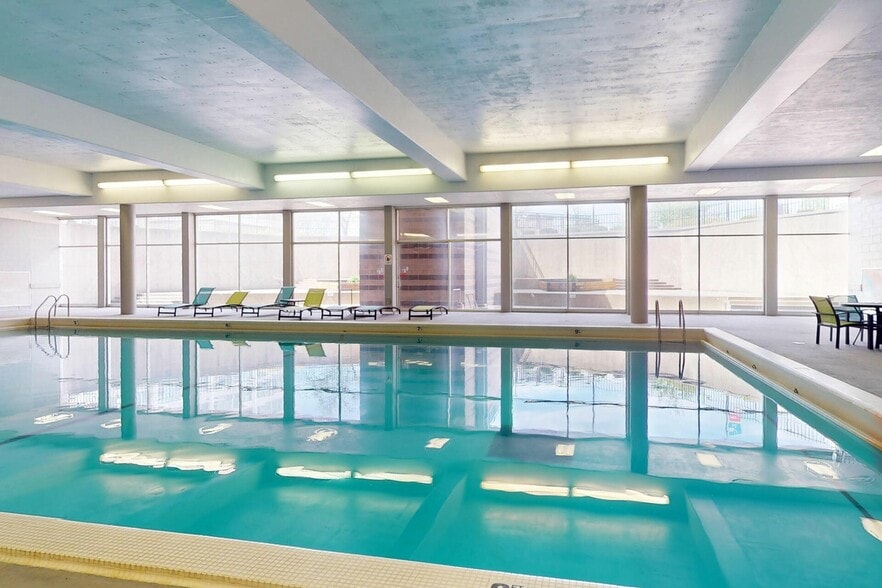 Relaxing Indoor Pool at University Plaza NIU Off-Campus Apartments - University Plaza Apartments
