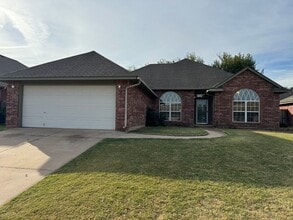 Building Photo - 4 bed in Putnam City! New luxury plank flooring , carpet , paint and new electric range!