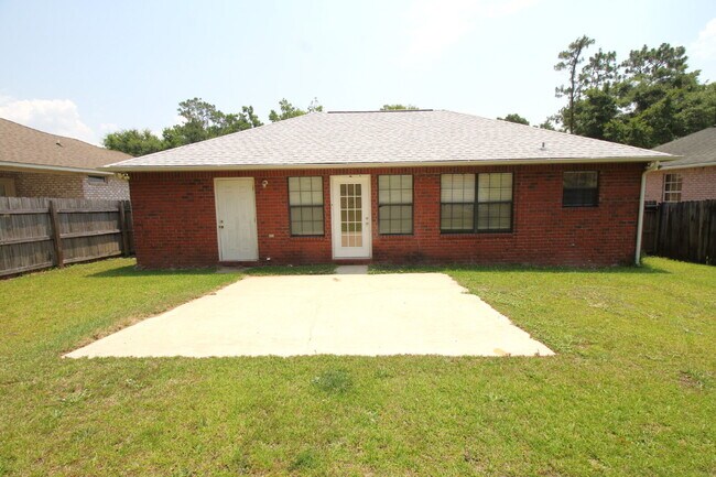 Building Photo - 3BR/2BA North Pensacola Brick Home with Bonus Room, Vaulted Ceilings & Privacy-Fenced Backyard Ne...