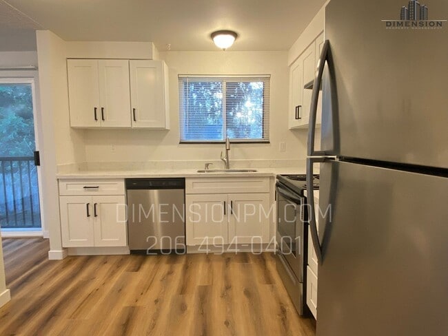 Building Photo - Covington Gem – Spacious 4BR/2BA Remodeled Home!