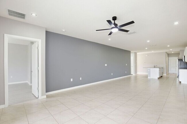 Building Photo - Move-In Ready 2BR/2BA Villa with Den + 2-Car Garage | Lake Nona Adjacent | Suncrest at St. Cloud