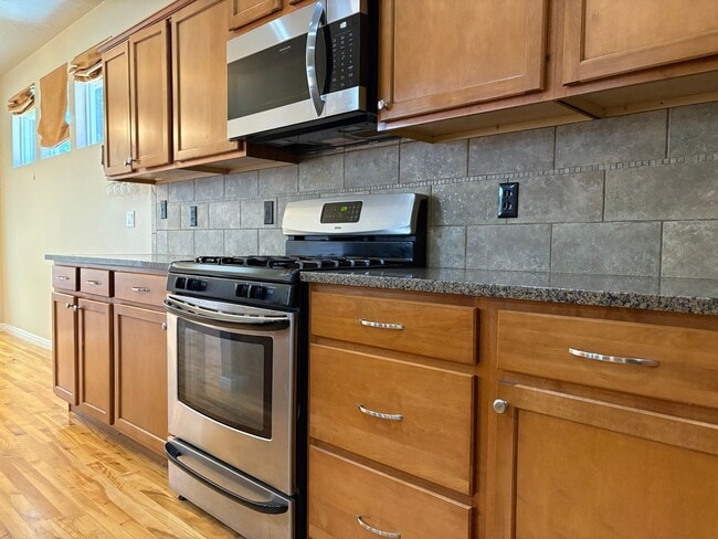 Building Photo - "Luxury Living: Stunning home with marble counter tops & Fireplace!"