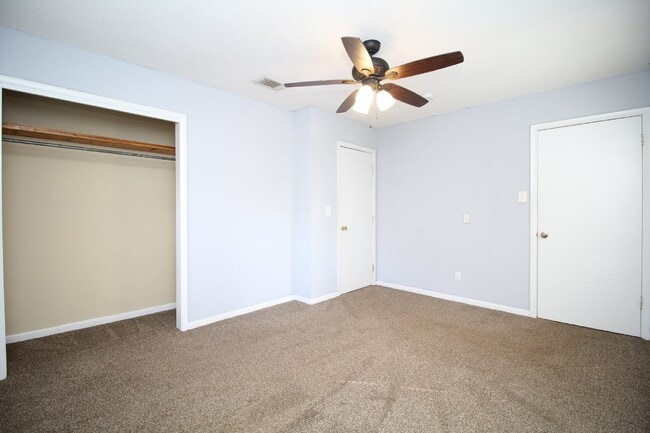 Building Photo - Spacious 3BR/1.5BA Home in Pace with Open Living Area, Tiled Family Room, and Fenced Backyard – M...