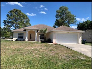 Building Photo - Charming 4 bed - 2 bath in North Port, Available Now!