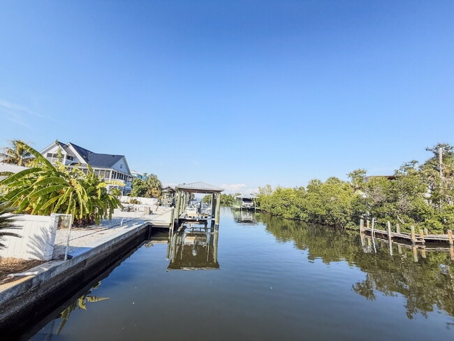 Building Photo - WATERFRONT POOL HOME ON A CANAL THAT LEADS STRAIGHT INTO TAMPA BAY - NEW DOCK AND SEAWALL COMING ...