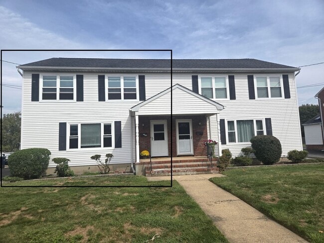 Primary Photo - Updates abound at this SPACIOUS, half dupl...