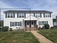 Building Photo - Updates abound at this SPACIOUS, half dupl...