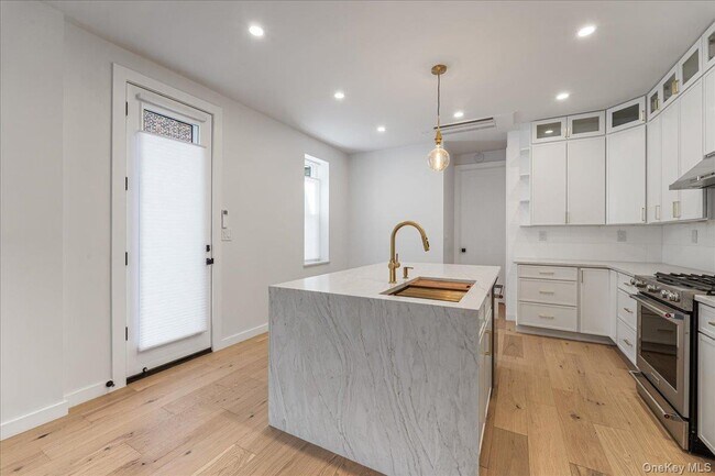 Building Photo - 36-34-36-11 11th St