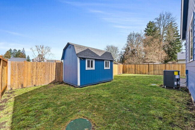 Building Photo - Vaulted Ceilings, A/C & Fully Fenced Yard – Beautiful 3-Bedroom Olympia Home!