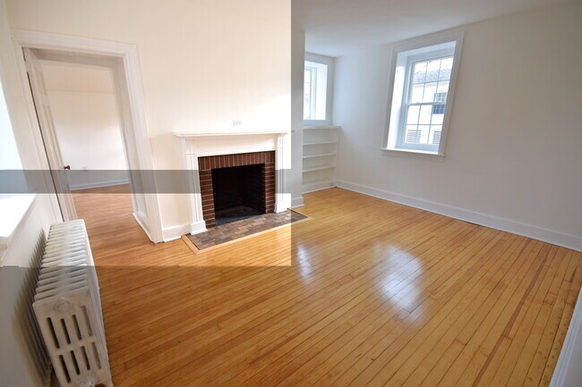 Living area with door to 2nd bedroom - 35 S State St