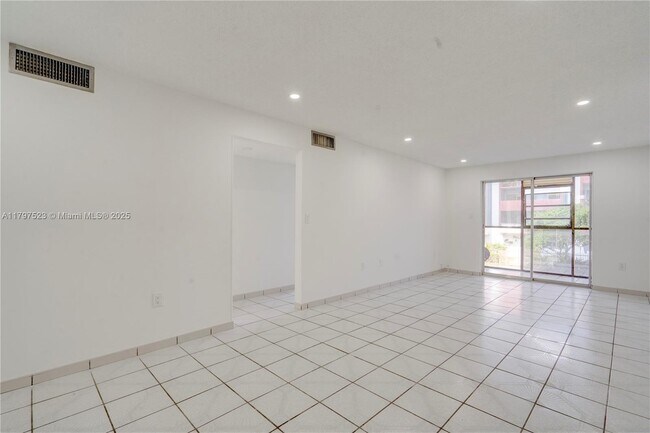 Building Photo - 6095 W 19th Ave