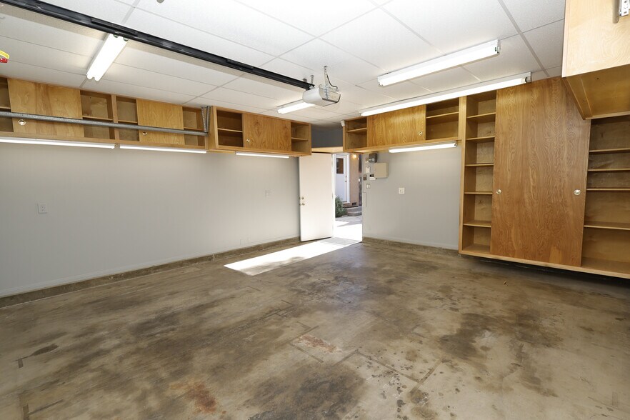 Detached two car garage with plenty of storage and lighting. - 4831 Canoga Ave